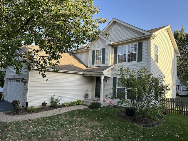 2008 Chang Ct, Naperville, IL 60540 - traditional-style home with driveway, a garage, fence, and a front lawn