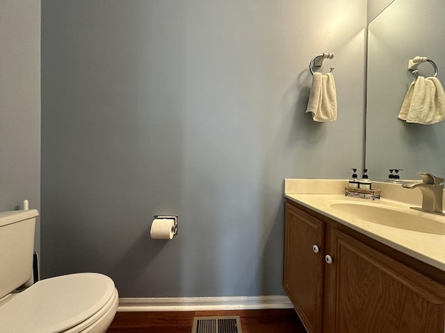 2008 Chang Ct, Naperville, IL 60540 - half bath with baseboards, visible vents, toilet, and vanity