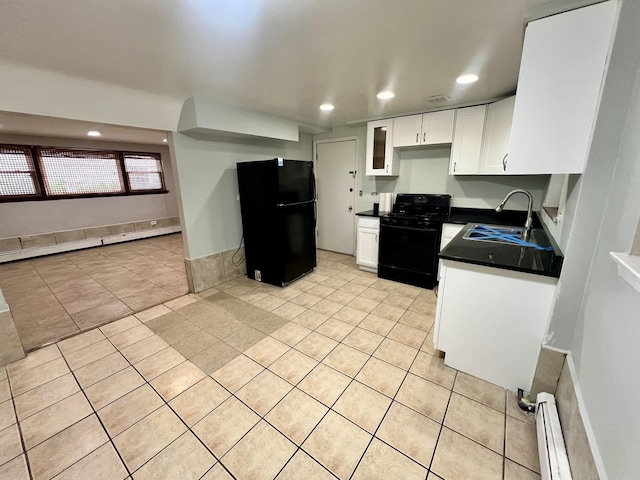 kitchen with black appliances, a sink, recessed lighting, dark countertops, and white cabinetry