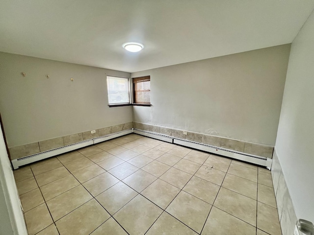 empty room featuring light tile patterned floors
