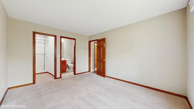 1704 Paddington Ave, Naperville, IL 60563 - unfurnished bedroom with light carpet, a spacious closet, a closet, and ensuite bathroom