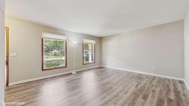 1704 Paddington Ave, Naperville, IL 60563 - unfurnished room featuring wood finished floors