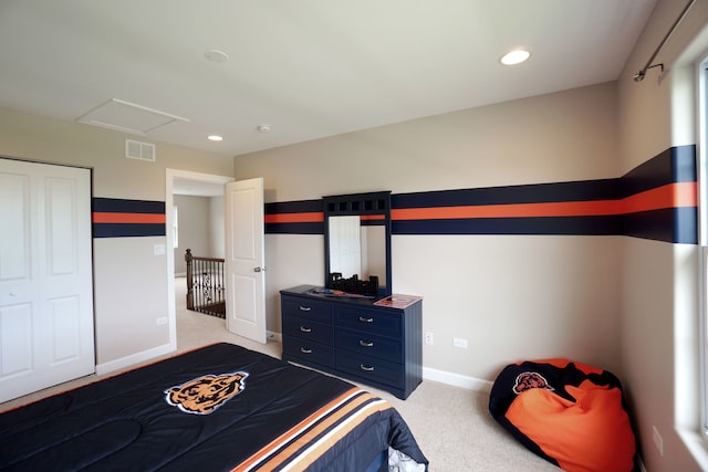 bedroom featuring visible vents, recessed lighting, light carpet, attic access, and baseboards