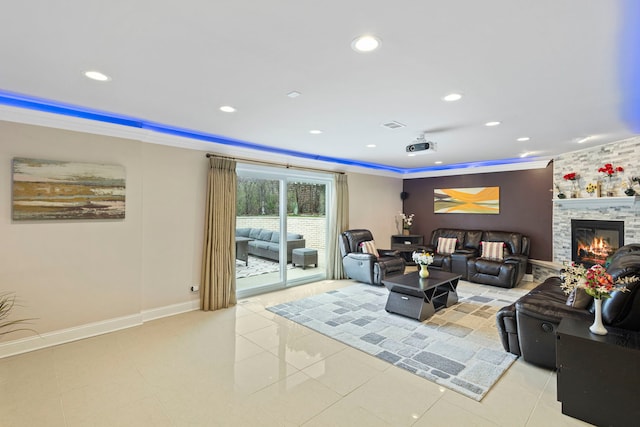 living area with light tile patterned floors, recessed lighting, and ornamental molding
