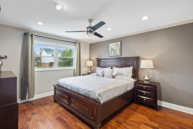 bedroom with baseboards, ornamental molding, dark wood-style floors, and recessed lighting