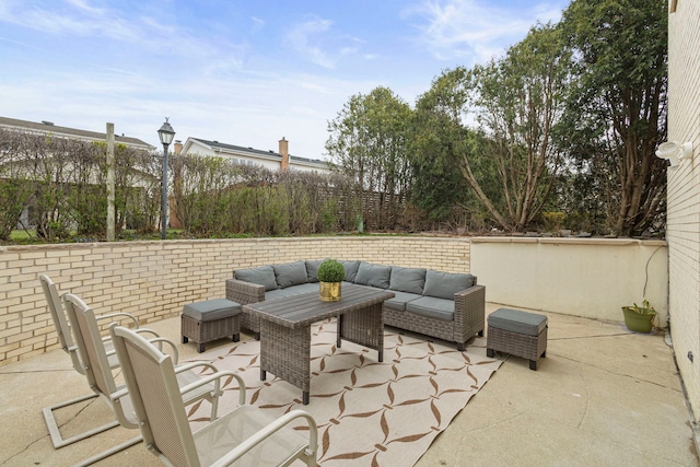 view of patio / terrace featuring a fenced backyard and outdoor lounge area