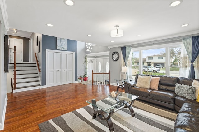 living room featuring wood finished floors, baseboards, and recessed lighting