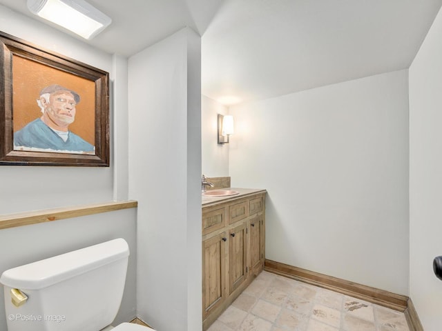 29W221 Oak Knoll Rd, West Chicago, IL 60185 - bathroom featuring baseboards, toilet, and vanity
