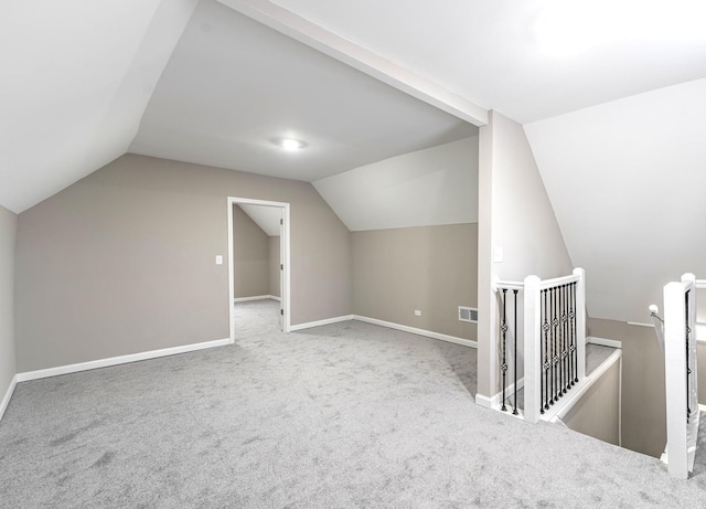 30 Washington Ave, La Grange, IL 60525 - bonus room featuring baseboards, visible vents, carpet floors, and lofted ceiling