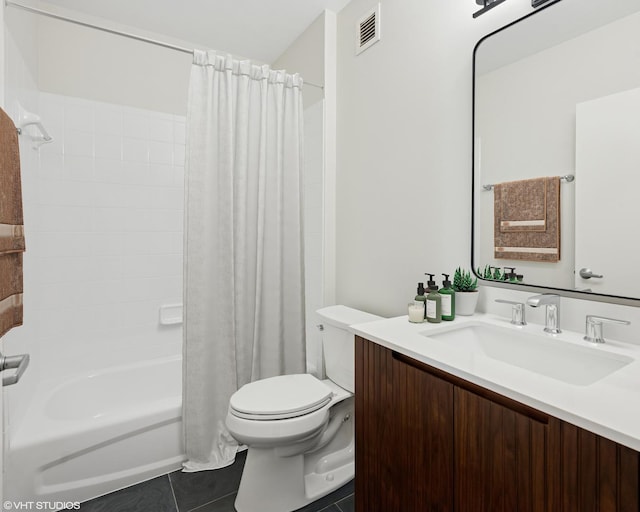 bathroom with toilet, vanity, shower / bath combo, and tile patterned flooring