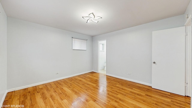 1317 Mackinaw Ave, Calumet City, IL 60409 - unfurnished room with baseboards and light wood-style flooring