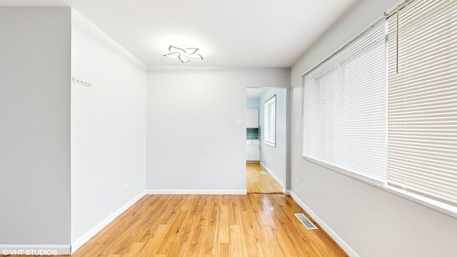 1317 Mackinaw Ave, Calumet City, IL 60409 - unfurnished room featuring baseboards, light wood-type flooring, and visible vents
