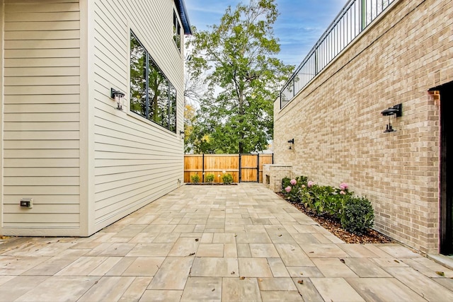 view of patio / terrace with fence