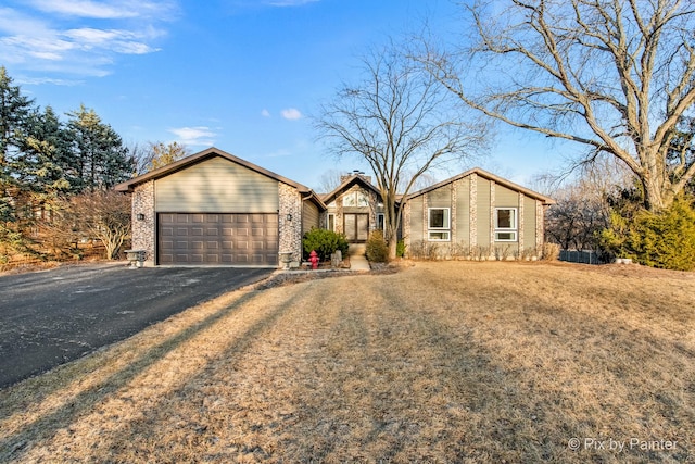 3134 Chellington Dr, Johnsburg, IL 60051 - mid-century inspired home featuring a garage and aphalt driveway