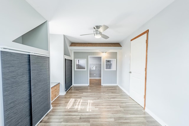 7733 Suburban Ln, Bridgeview, IL 60455 - hallway featuring light wood finished floors and baseboards