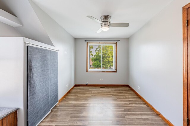 7733 Suburban Ln, Bridgeview, IL 60455 - full bathroom featuring shower / bath combo with shower curtain and vanity