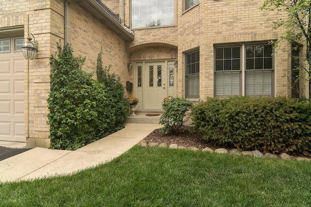 doorway to property with brick siding