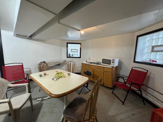 dining area with concrete flooring