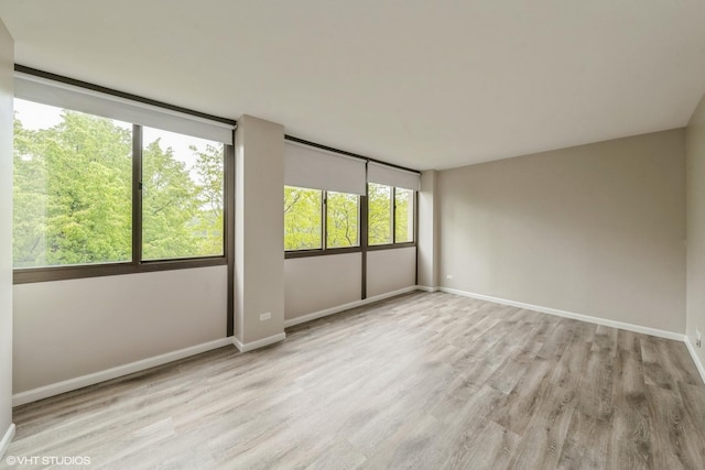 4850 S Lake Park Ave Unit 512, Chicago, IL 60615 - empty room featuring baseboards and wood finished floors
