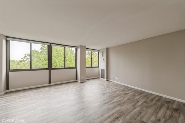 4850 S Lake Park Ave Unit 512, Chicago, IL 60615 - unfurnished room with wood finished floors and baseboards
