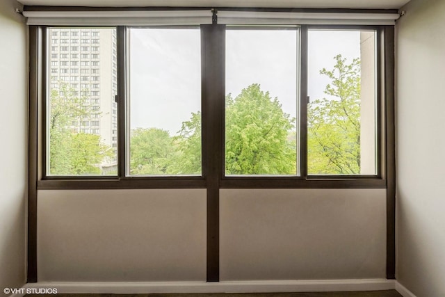 4850 S Lake Park Ave Unit 512, Chicago, IL 60615 - spare room featuring healthy amount of natural light and baseboards