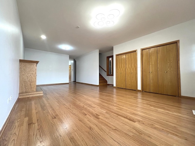 1019 W 47th Pl, Chicago, IL 60609 - interior space featuring light wood-style flooring, two closets, and baseboards