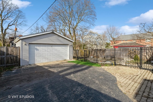 detached garage with fence