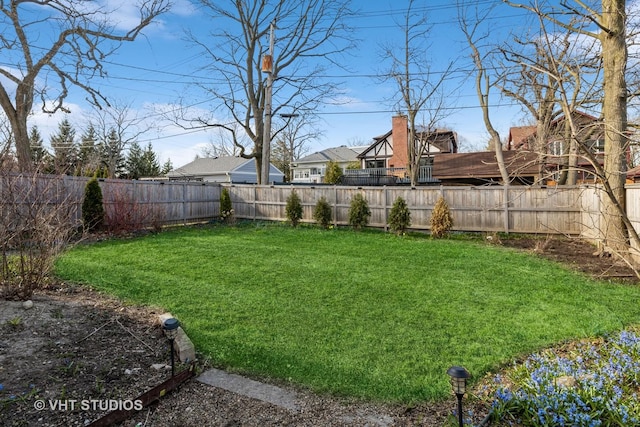 view of yard featuring a fenced backyard