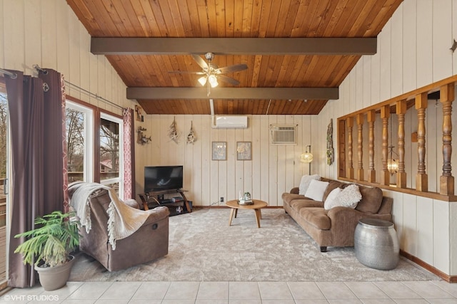 living area with a wall mounted AC, an AC wall unit, light tile patterned floors, ceiling fan, and vaulted ceiling with beams