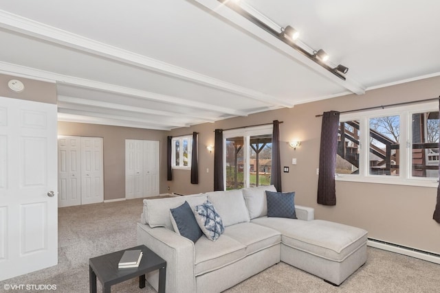 carpeted living area featuring beamed ceiling and a baseboard heating unit