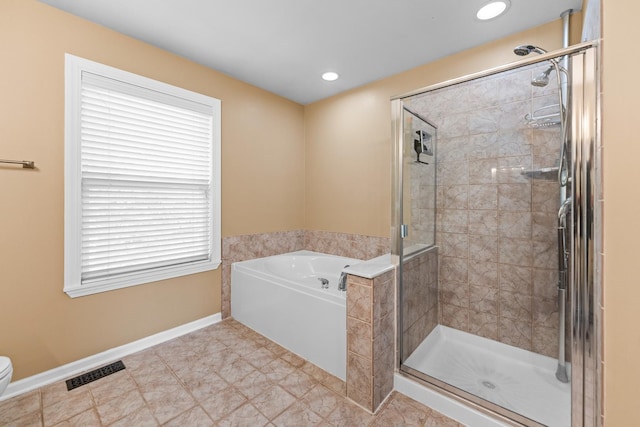 2571 Rourke Dr, Aurora, IL 60503 - bathroom featuring a bath, a stall shower, baseboards, toilet, and recessed lighting