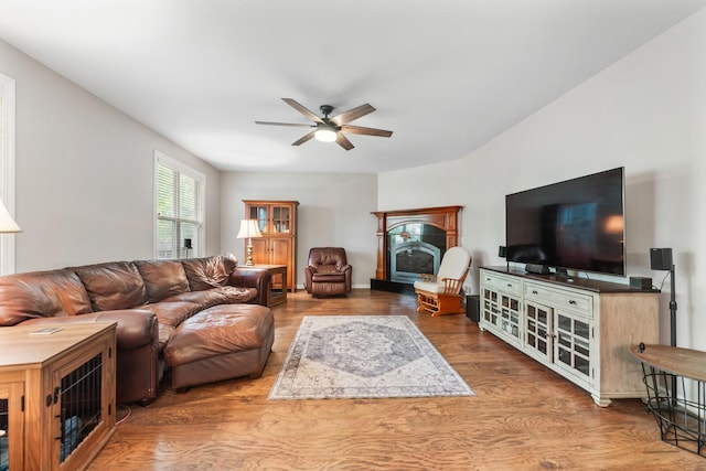 2571 Rourke Dr, Aurora, IL 60503 - living area with ceiling fan, wood finished floors, and a fireplace