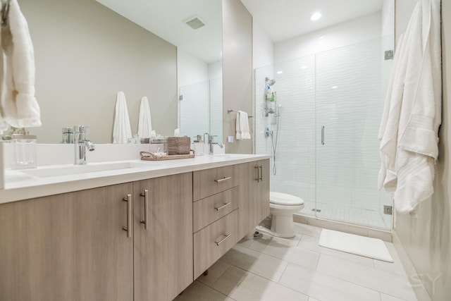 full bathroom with toilet, tile patterned floors, a sink, and visible vents