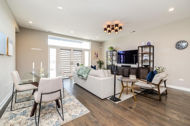 living room with baseboards, dark wood-style floors, visible vents, and recessed lighting