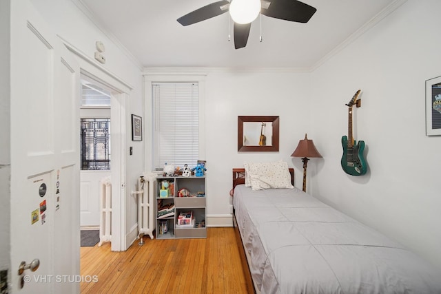 5141 S Greenwood Ave Unit 1, Chicago, IL 60615 - bedroom featuring wood finished floors, ornamental molding, and a ceiling fan