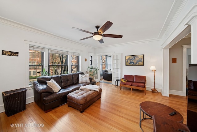 5141 S Greenwood Ave Unit 1, Chicago, IL 60615 - living room featuring baseboards, crown molding, light wood-style floors, and a ceiling fan