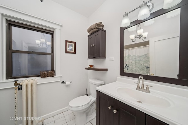 5141 S Greenwood Ave Unit 1, Chicago, IL 60615 - full bathroom featuring tile patterned flooring, vanity, toilet, baseboards, and radiator heating unit