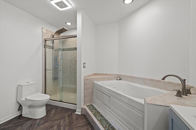 bathroom featuring a bath, a stall shower, vanity, toilet, and recessed lighting