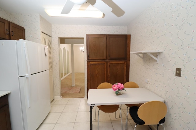 945 E Kenilworth Ave Unit 429, Palatine, IL 60074 - dining room featuring ceiling fan, wallpapered walls, and light tile patterned floors