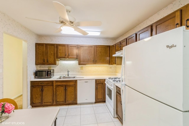 945 E Kenilworth Ave Unit 429, Palatine, IL 60074 - kitchen with white appliances, a sink, brown cabinets, light countertops, and wallpapered walls