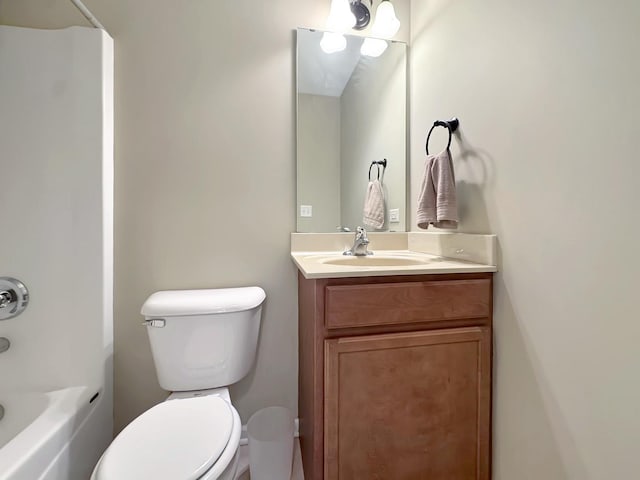 bathroom featuring shower / tub combination, toilet, and vanity