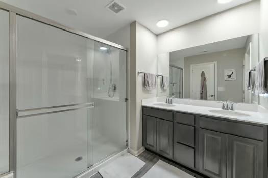 1672 Bentz Way, Batavia, IL 60510 - full bathroom with double vanity and a shower stall