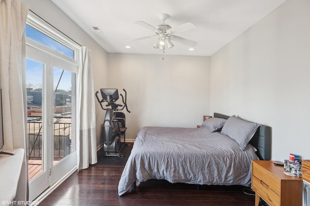bedroom with recessed lighting, access to outside, visible vents, and hardwood / wood-style floors
