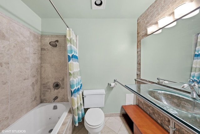 full bathroom featuring vanity, baseboards, shower / bath combo, tile patterned floors, and toilet