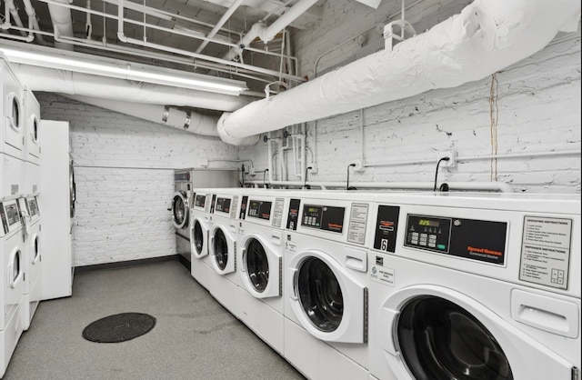 common laundry area with washer and clothes dryer