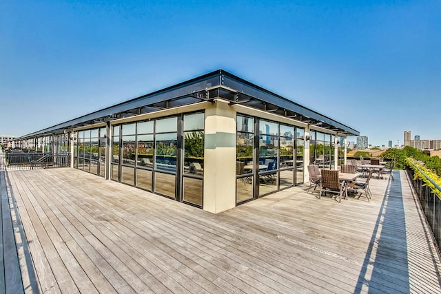 wooden terrace with a view of city