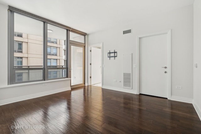 600 N Lake Shore Dr Unit 2110, Chicago, IL 60611 - spare room featuring wood finished floors and baseboards