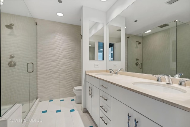 600 N Lake Shore Dr Unit 2110, Chicago, IL 60611 - full bathroom featuring a stall shower, toilet, double vanity, and recessed lighting