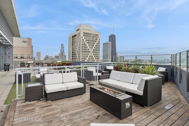600 N Lake Shore Dr Unit 2110, Chicago, IL 60611 - deck with an outdoor living space with a fire pit and a view of skyline
