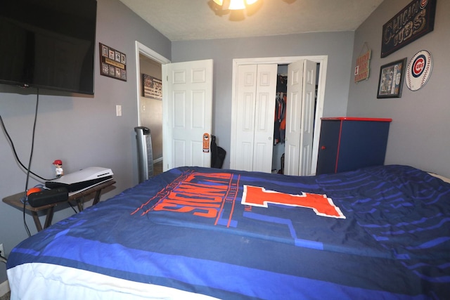 bedroom featuring a closet and a ceiling fan